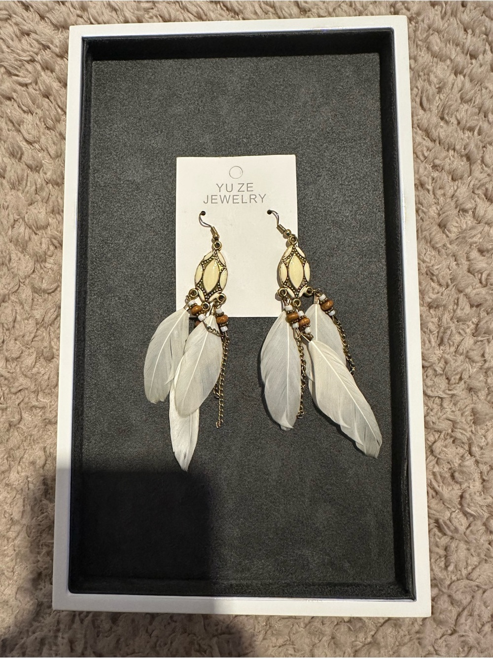 White Feather Dangle Earrings with Antique Gold Accents